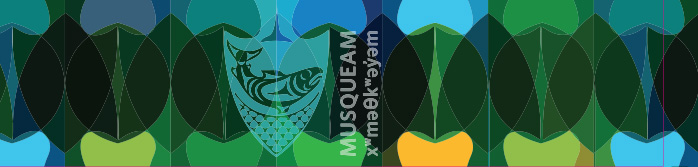 The colourful blue and green construction hoarding with the Musqueam and UBC logos