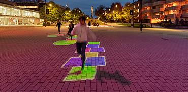 Children play in Lee Square